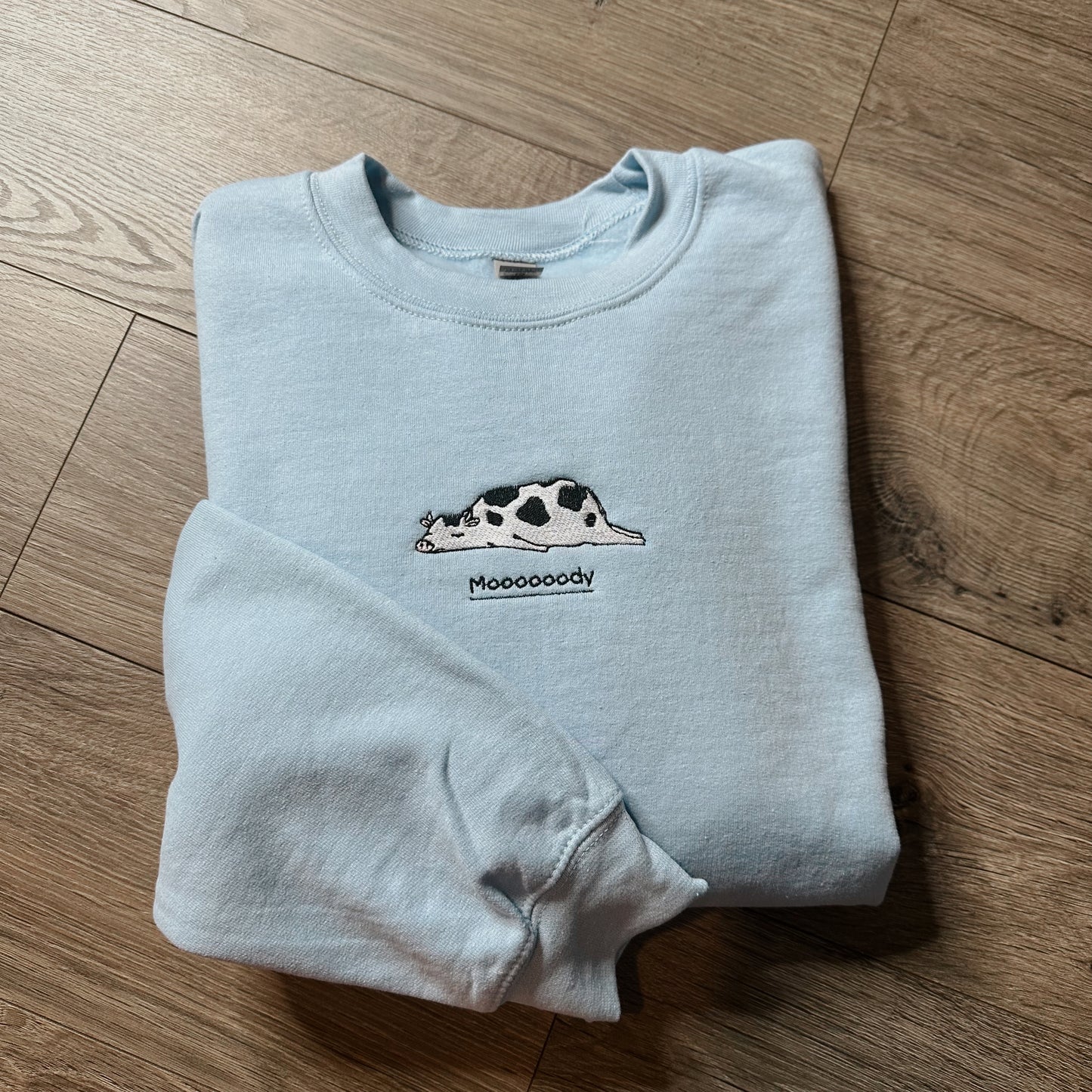 Moody Cow Embroidered Crewneck